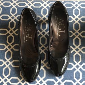 Black patent leather AGL pumps